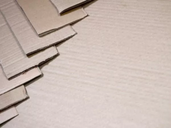Several different types of cardboard laid in a row, showing the different types of moving boxes.