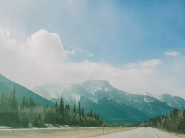 A scenic view of the mountains after driving a rental truck into Canada.