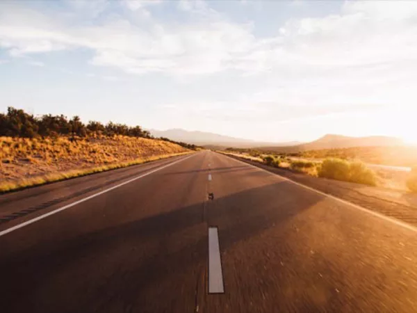 Wide open road during a cross-country road trip.