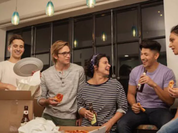 Group having a farewell party for a friend.