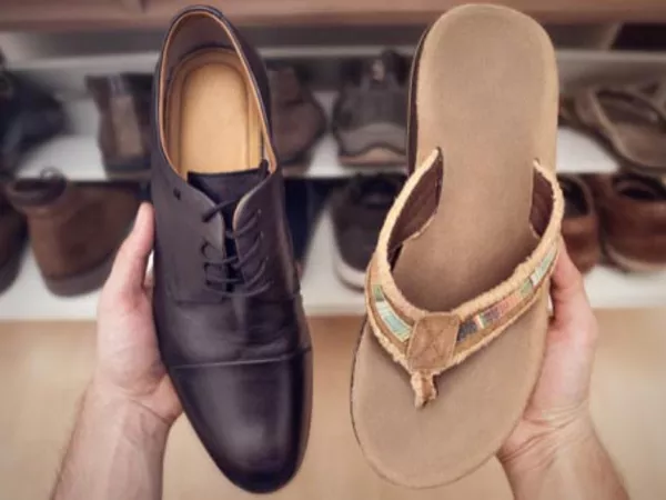 Person packing shoes for a move.