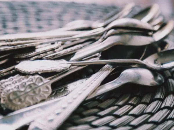 Packing up silverware for a move.