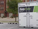A U-Pack ReloCube metal moving container.