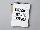 enclosed trailer rentals written on notebook