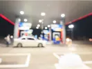 car at gas station