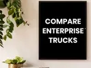A black canvas with white text reading Compare Enterprise Trucks